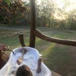 Luxury open-air claw bath overlooking 100 year old Mango Tree